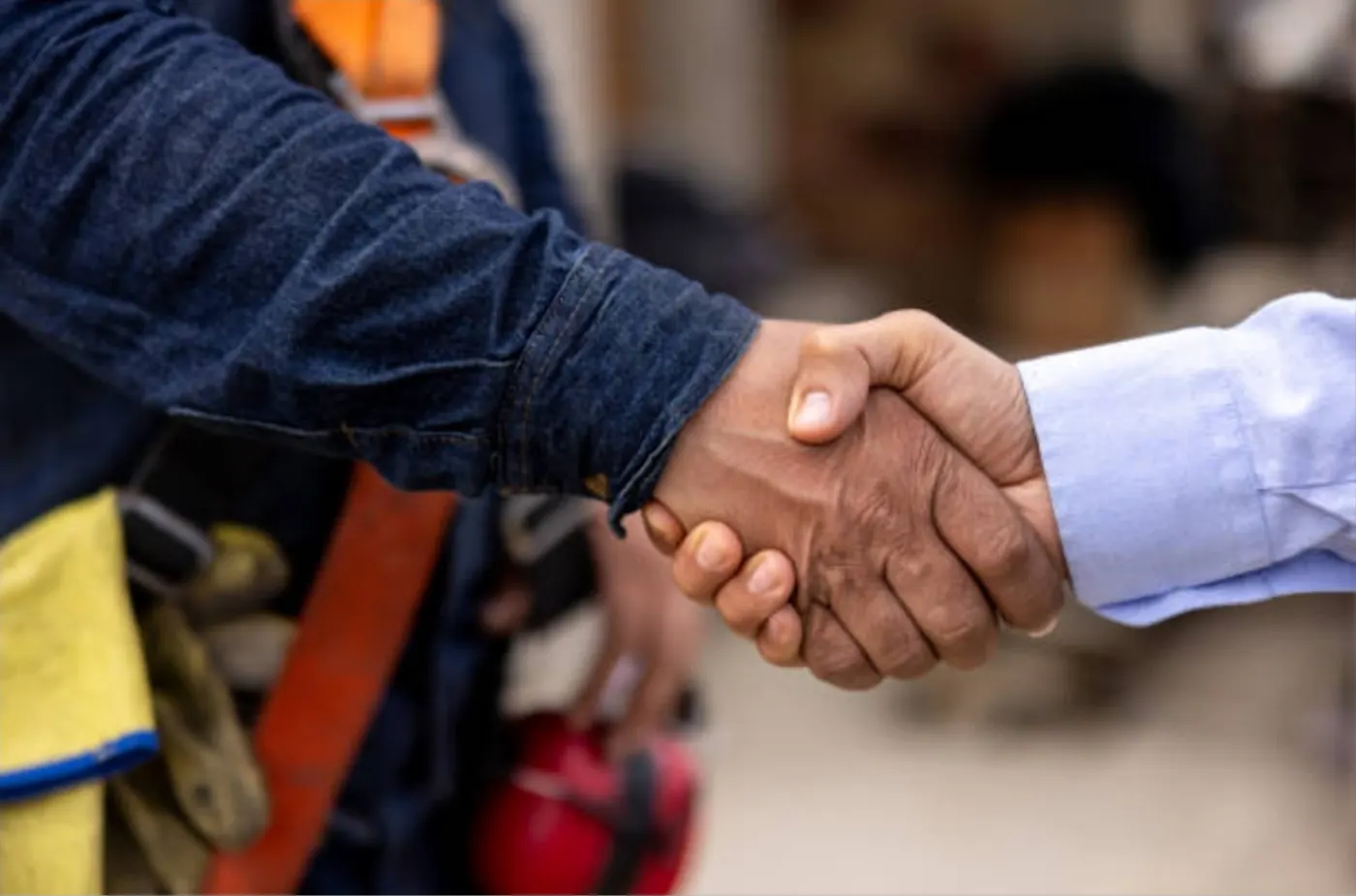 Contractor and business partner shaking hands